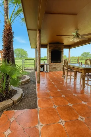 a swimming pool with outdoor seating and yard