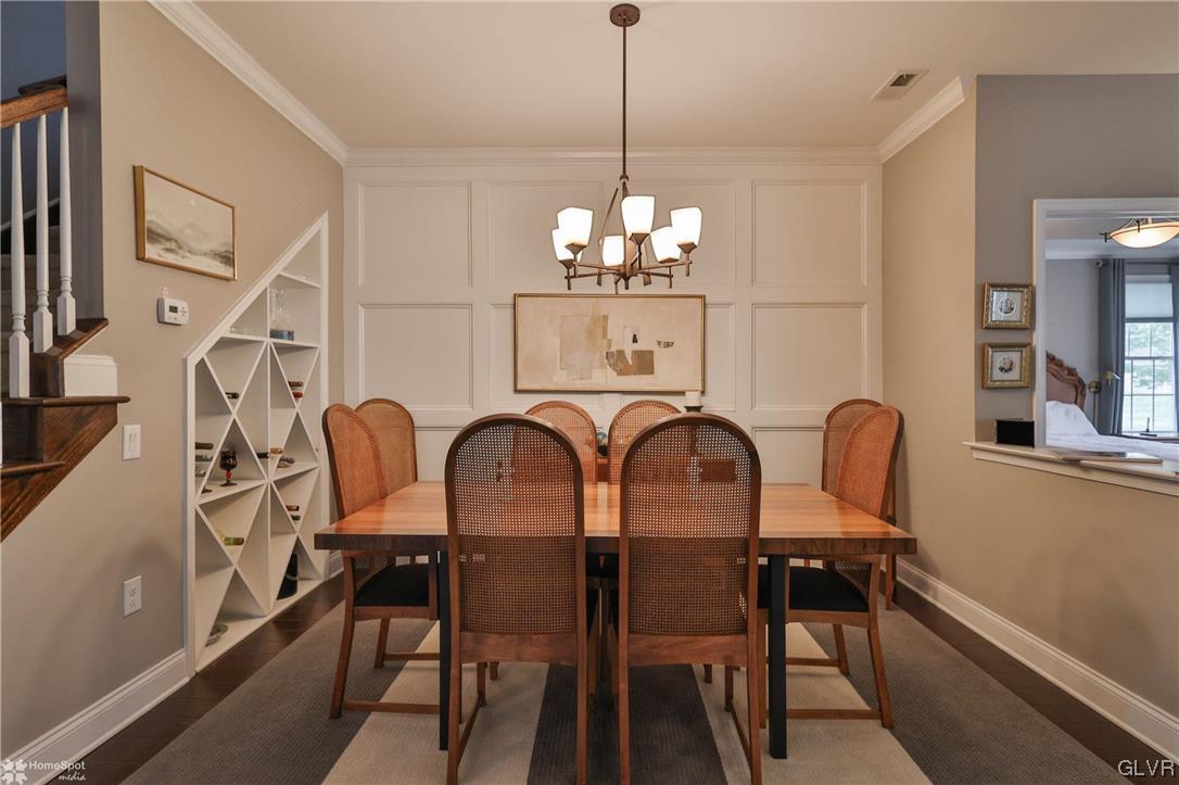1035 Declaration Drive Bethlehem, PA 18017 - Photo 11 of 38 a view of a dining room with furniture wooden floor and chandelier