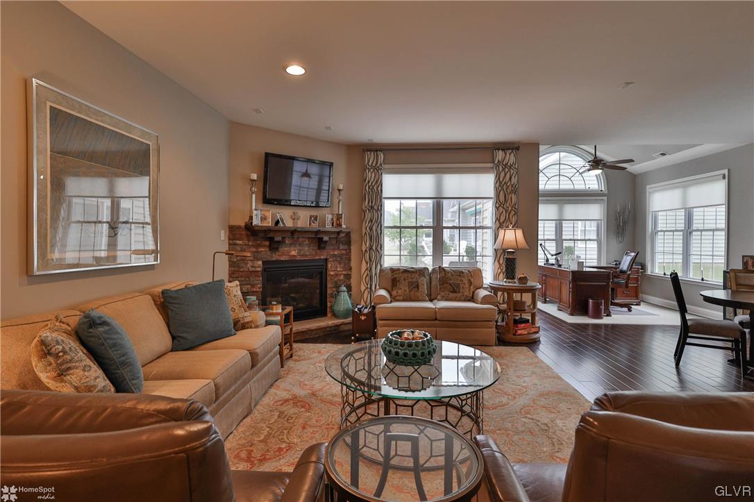 1035 Declaration Drive Bethlehem, PA 18017 - Photo 23 of 38 a living room with fireplace furniture and a large window