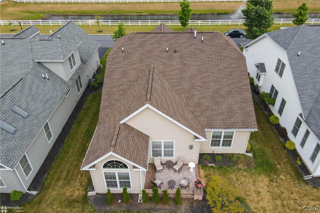 1035 Declaration Drive Bethlehem, PA 18017 - Photo 35 of 38 a aerial view of a house with a yard and lake view