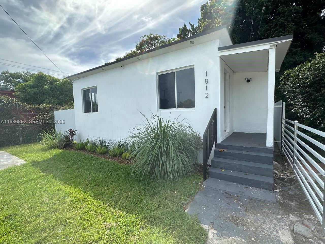 1812 Northwest 64th Street Miami, FL 33147 - Photo 1 of 60