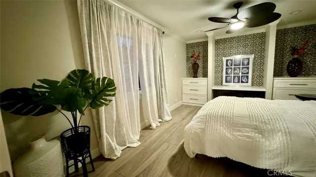 a bathroom with a double vanity sink and a large mirror