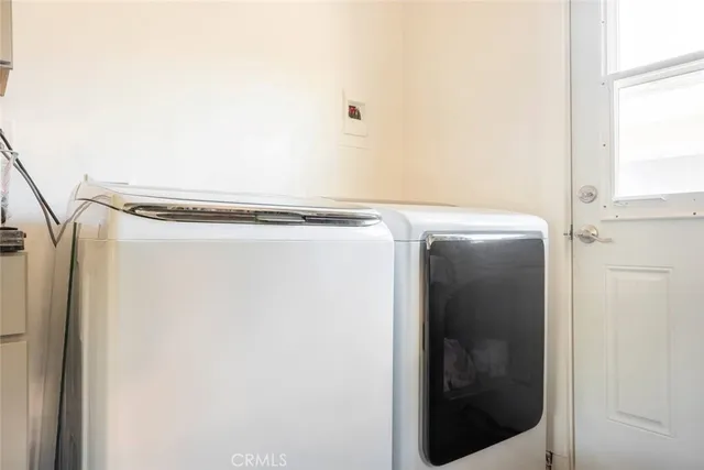 a view of a terrace with furniture and stove