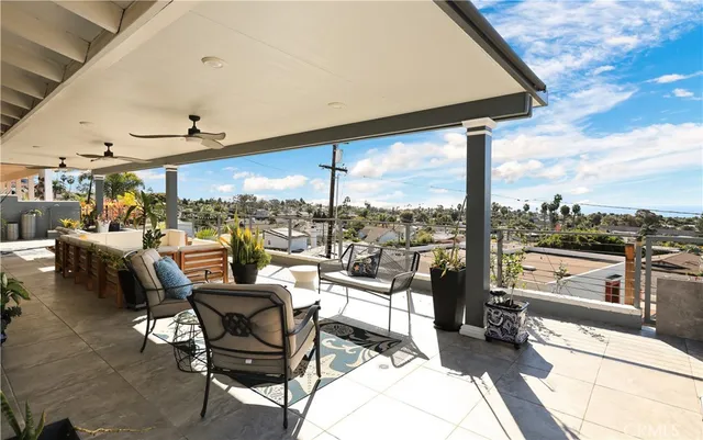 a view of a hall way with furniture