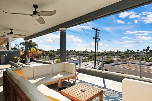 a view of a dining room with furniture wooden floor and chandelier