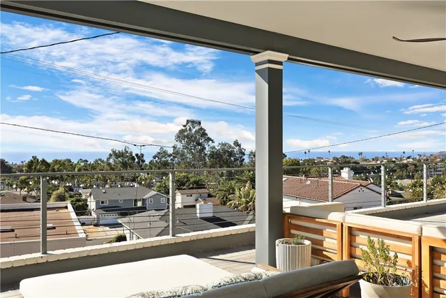 a view of a balcony with city view