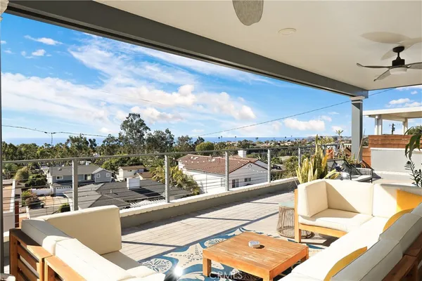 a view of a balcony with couches