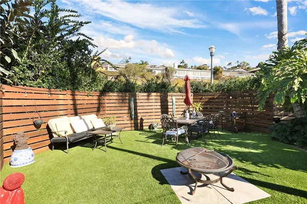 a view of an outdoor sitting area with furniture