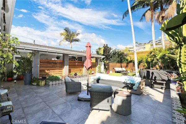 a view of roof deck with chairs
