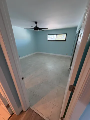 a kitchen with sink and window