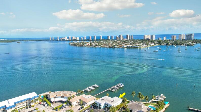 360 Wilma Circle, Unit 7 Riviera Beach, FL 33404 - Photo 4 of 15 a view of a lake with outdoor space