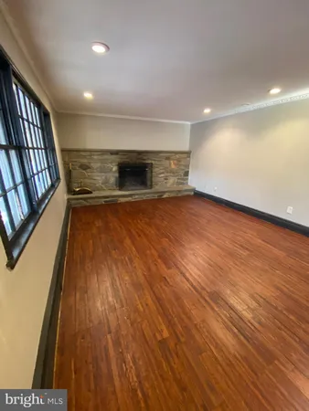 a view of a deck with chair and table of the backyard