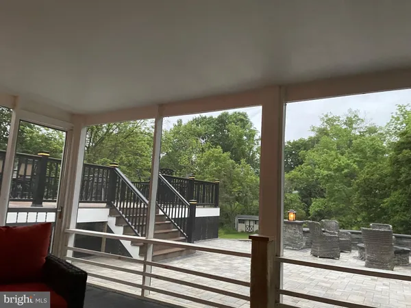 a view of a yard next to a house