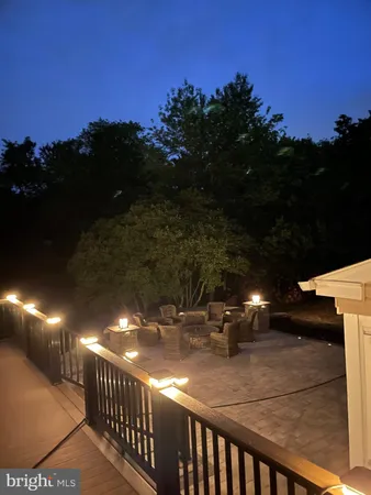 a view of roof deck with patio