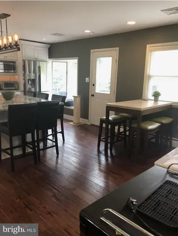 a terrace view with sitting space and garden