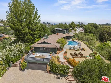 a aerial view of a house with a garden