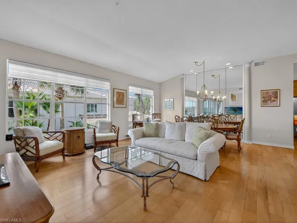 $575,000 | 24360 Sandpiper Isle Way, Unit 205, Bonita Springs, FL 34134