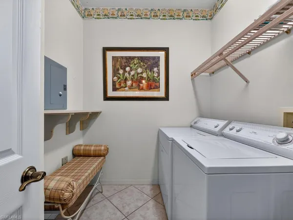 $575,000 | 24360 Sandpiper Isle Way, Unit 205, Bonita Springs, FL 34134