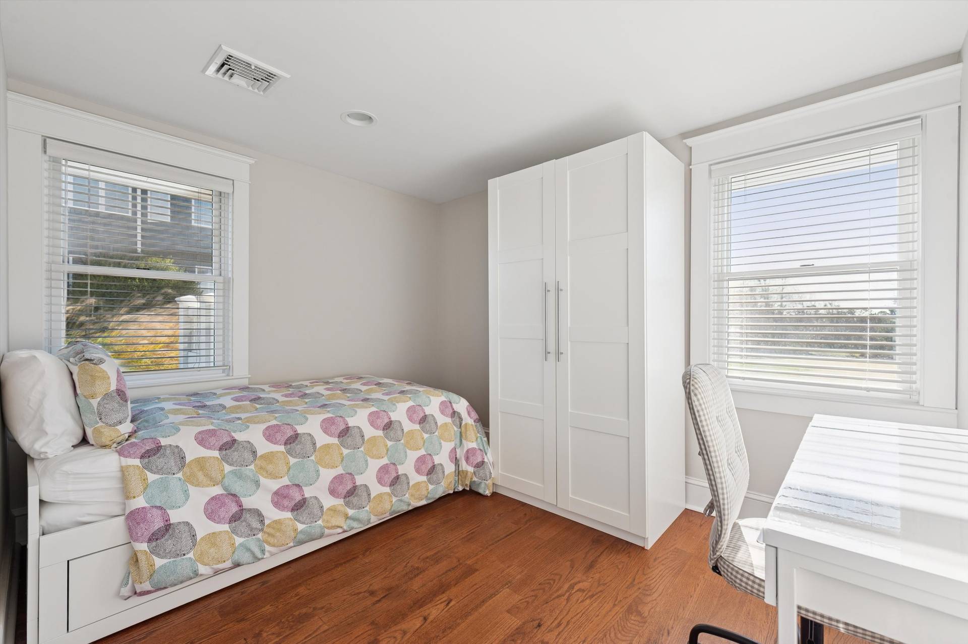 135 Little Neck Road Southampton, NY 11968 - Photo 15 of 20 a bedroom with a bed and a window