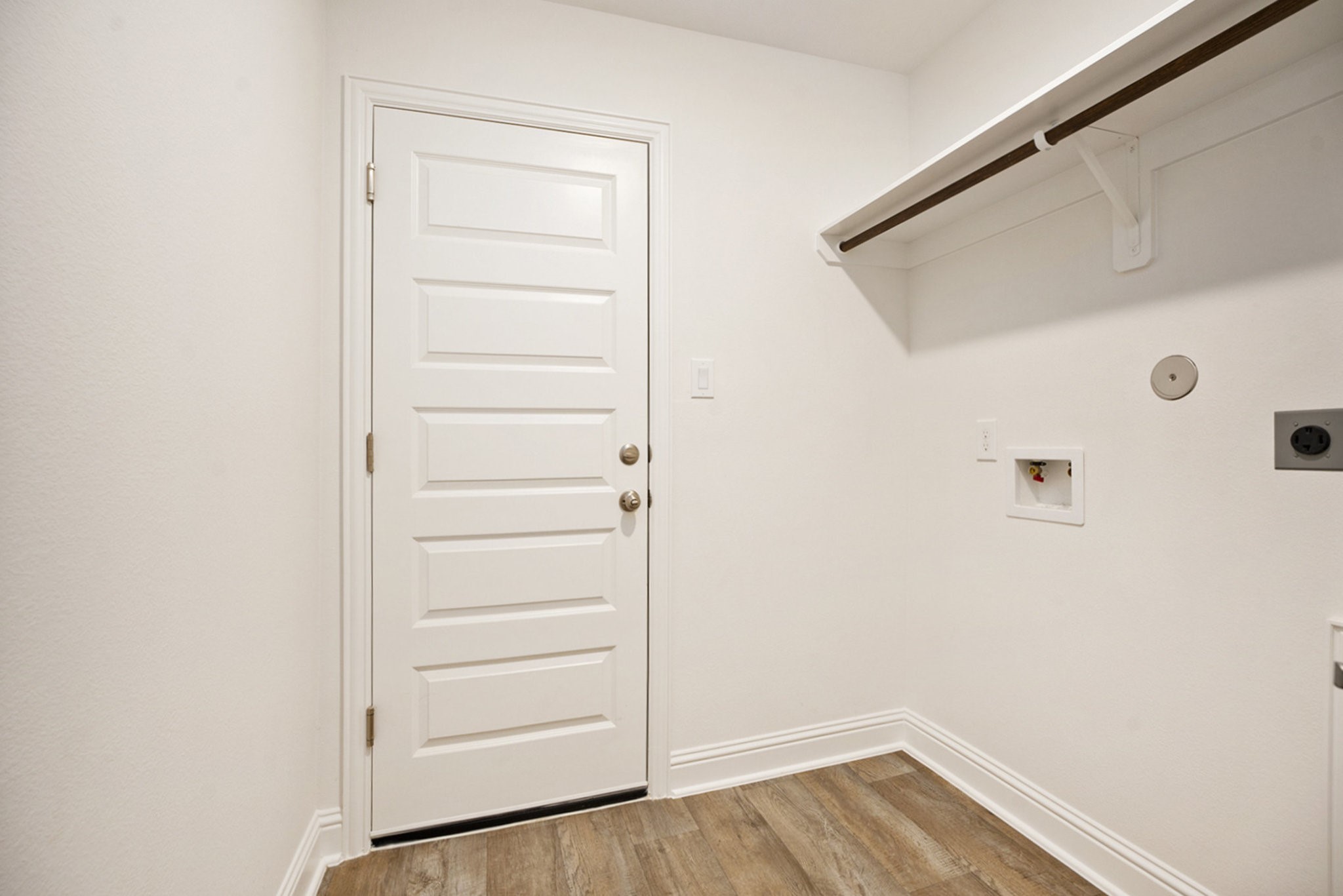 412 Bryan Way Angleton, TX 77515 - Photo 14 of 15 a view of walk in closet with empty racks