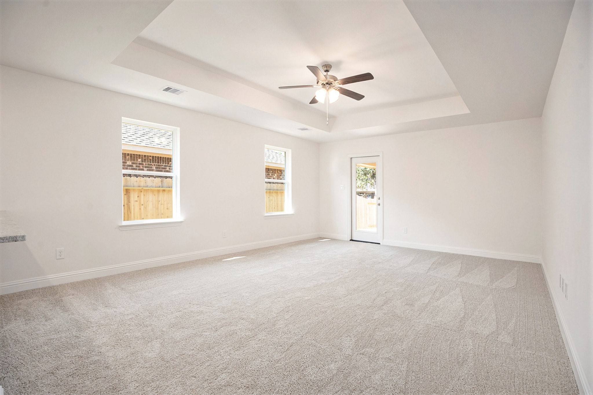 412 Bryan Way Angleton, TX 77515 - Photo 5 of 15 a view of an empty room with a window