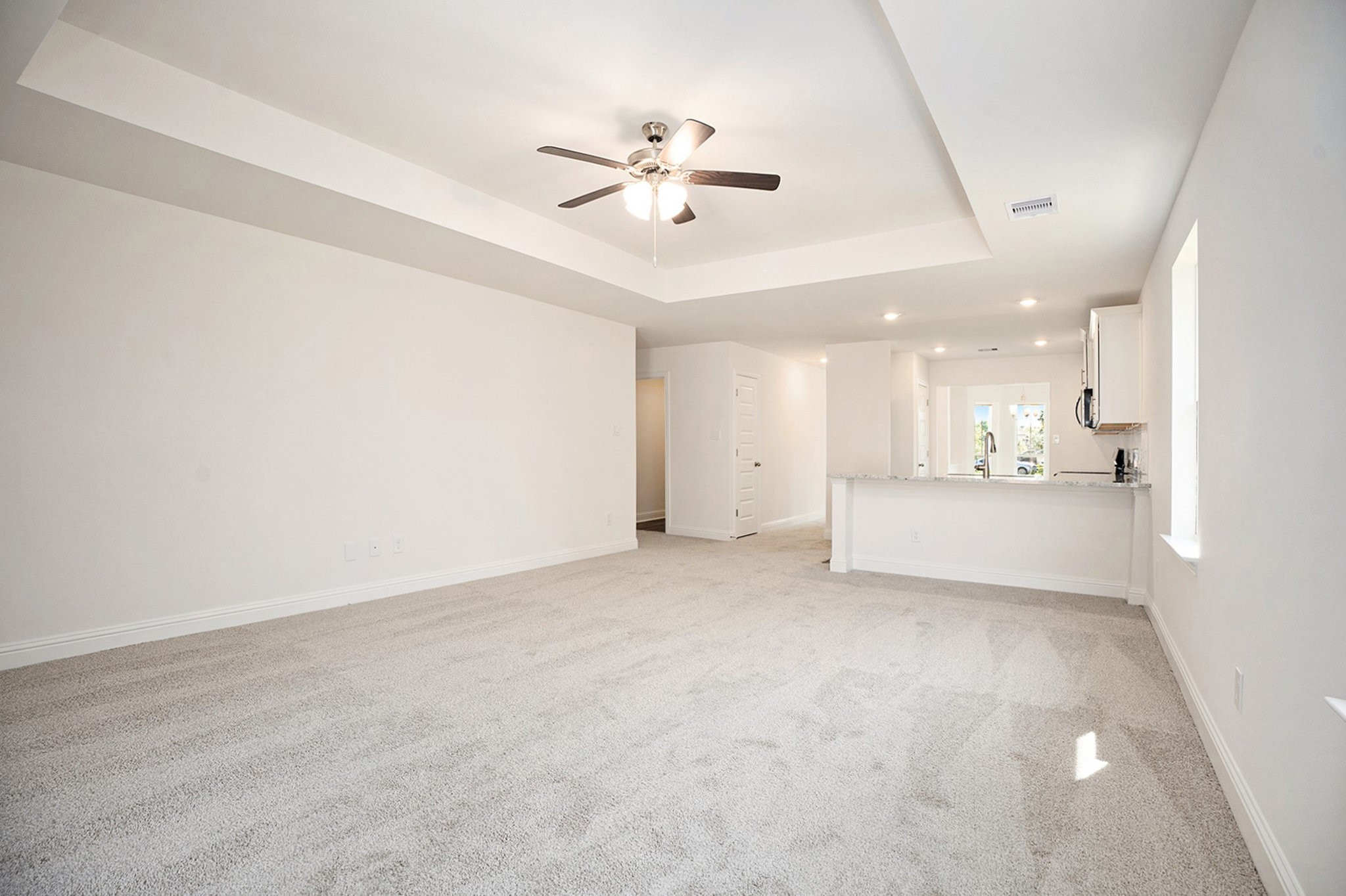 412 Bryan Way Angleton, TX 77515 - Photo 6 of 15 a view of a livingroom with a ceiling fan