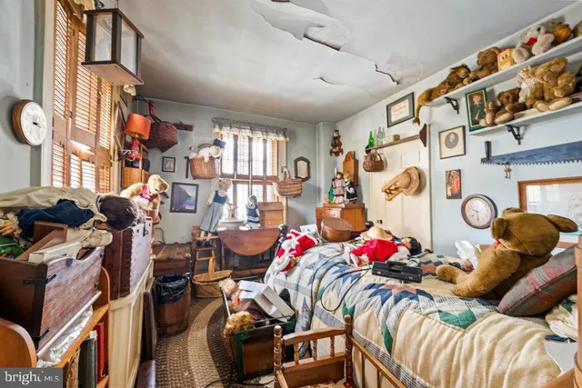 a bed room with a bed and a furniture