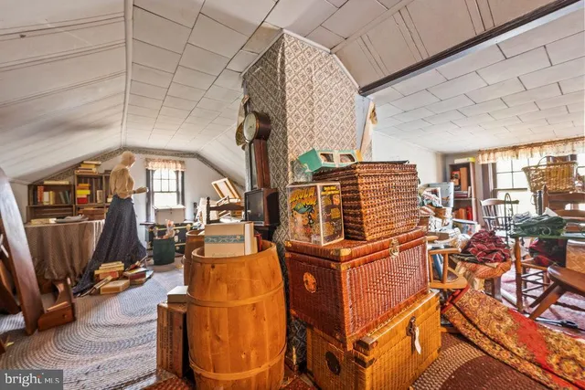a view of a living room with furniture