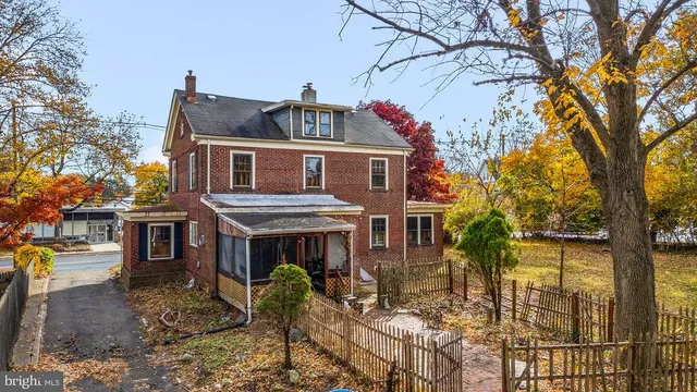 a front view of a house with a porch