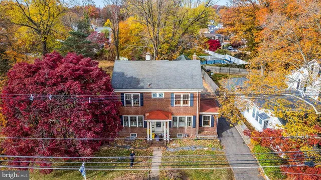 front view of a house with a small yard