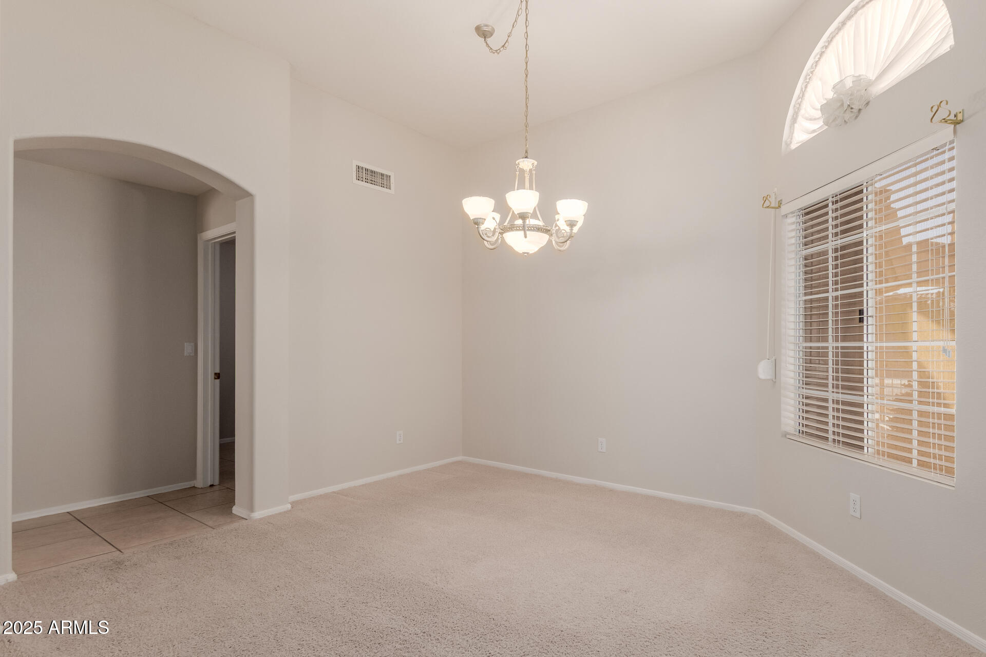 14588 West Bison Path Surprise, AZ 85374 - Photo 11 of 42 a view of livingroom with window