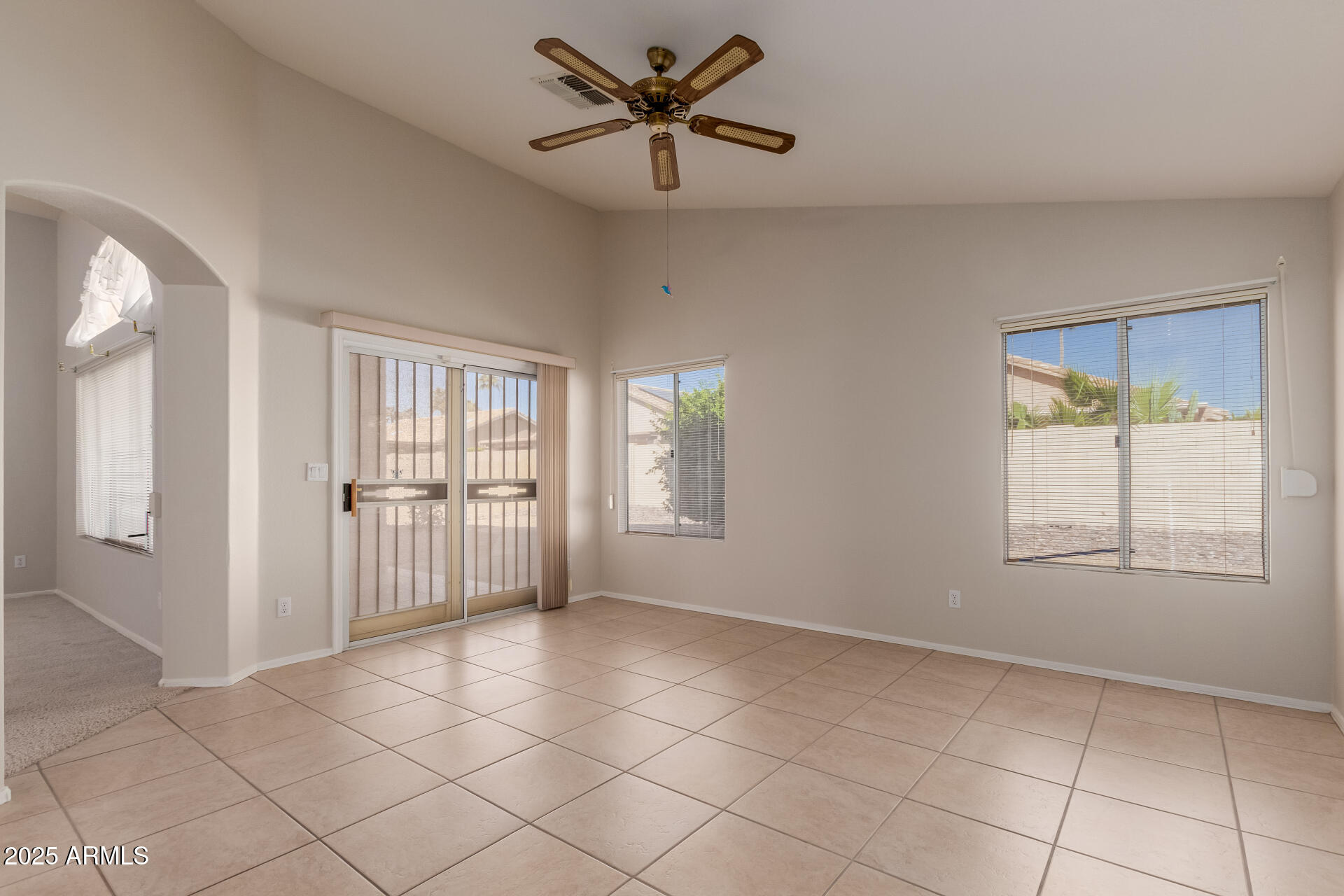 14588 West Bison Path Surprise, AZ 85374 - Photo 12 of 42 a view of an empty room with a window