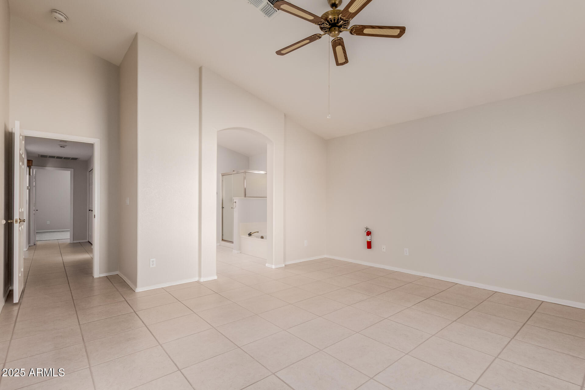 14588 West Bison Path Surprise, AZ 85374 - Photo 20 of 42 a view of a room with rack on the wall