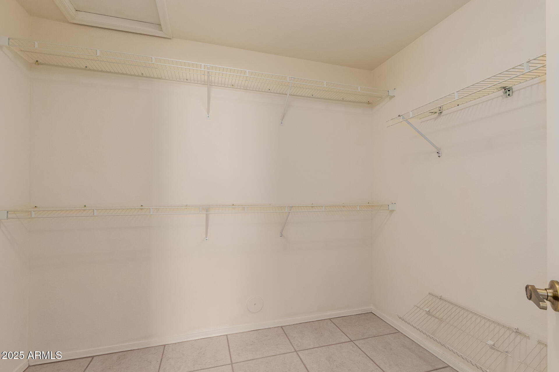 14588 West Bison Path Surprise, AZ 85374 - Photo 25 of 42 a view of a room with shelf