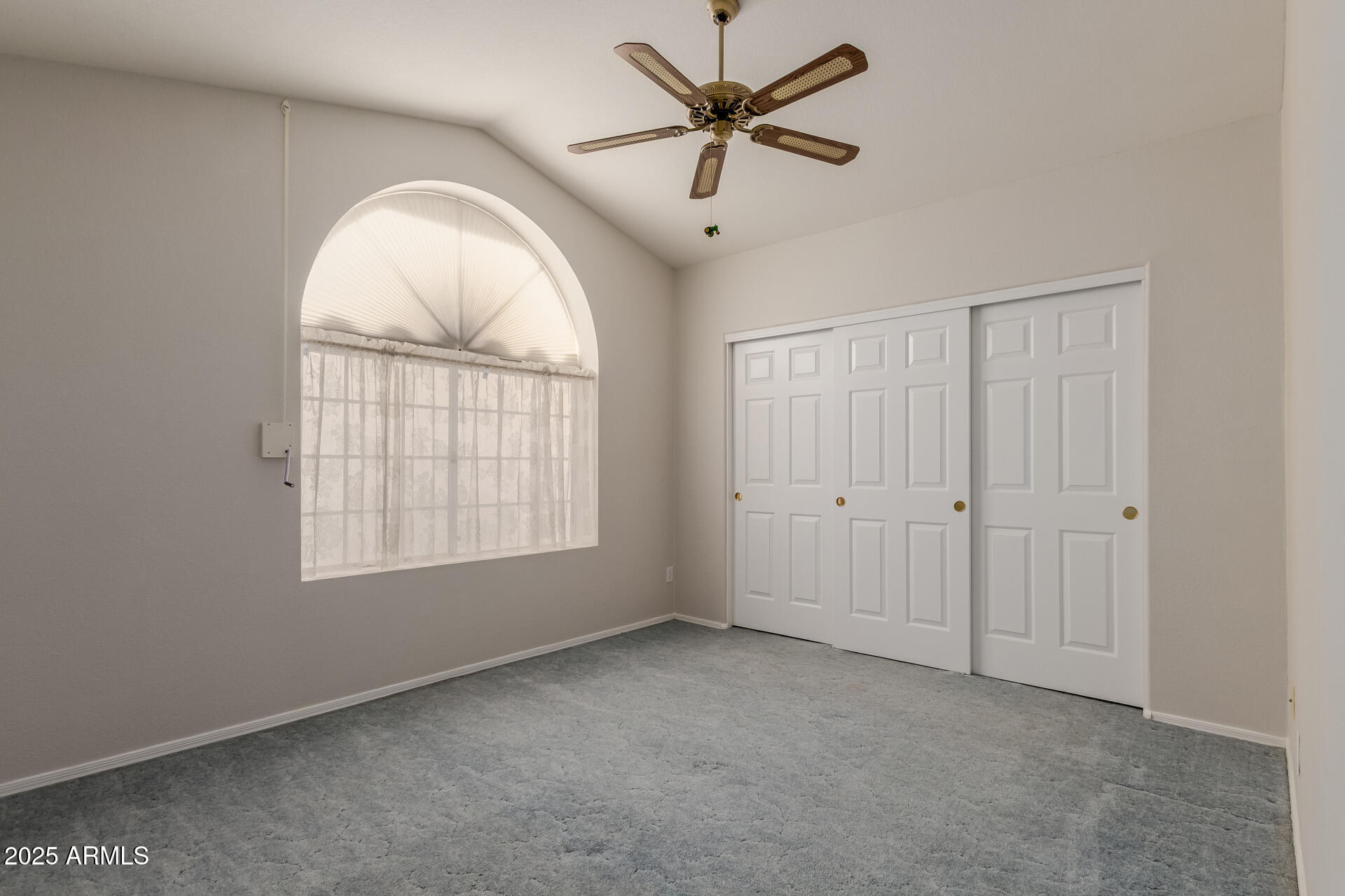 14588 West Bison Path Surprise, AZ 85374 - Photo 26 of 42 a view of an empty room with a window