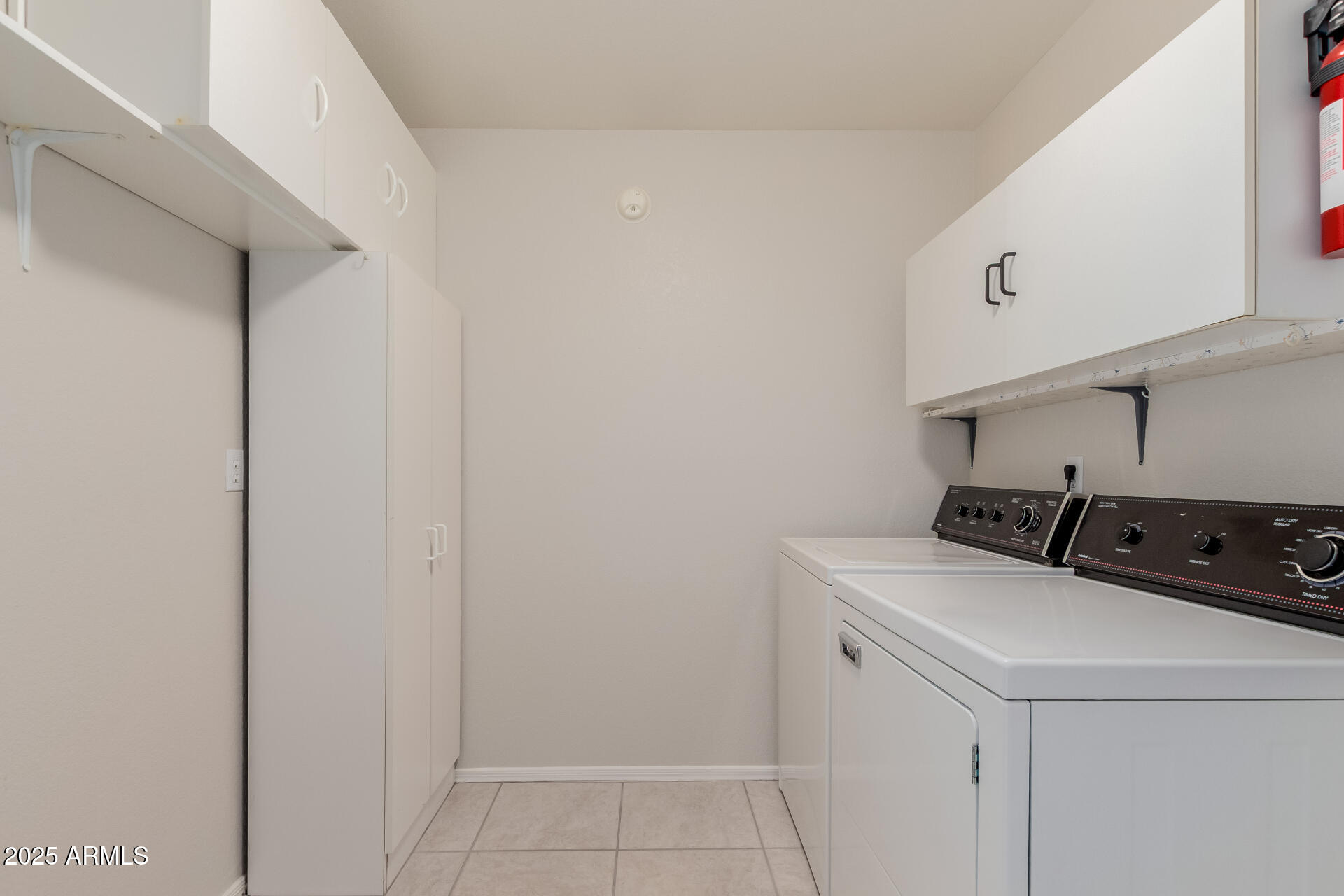 14588 West Bison Path Surprise, AZ 85374 - Photo 35 of 42 a utility room with dryer and washer