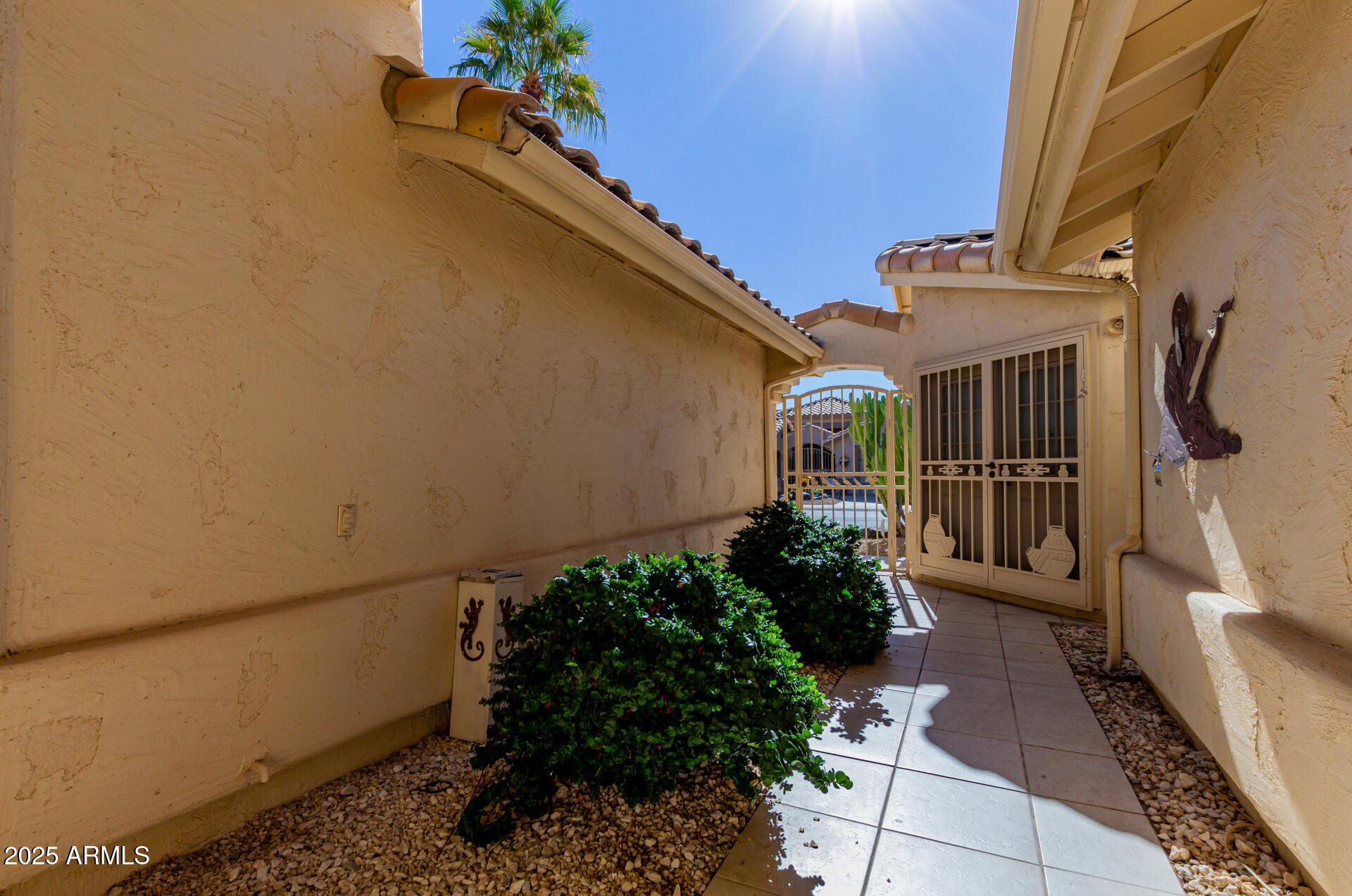 14588 West Bison Path Surprise, AZ 85374 - Photo 5 of 42 a front view of a house with a yard