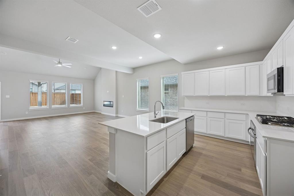 2109 Sunshining Road Princeton, TX 75407 - Photo 8 of 35 Kitchen in the Stanley II home plan by Trophy Signature Homes – REPRESENTATIVE PHOTO