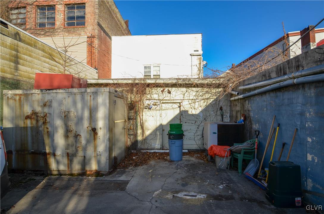 36 East Ridge Street Lansford, PA 18232 - Photo 2 of 3 a view of a house with backyard and sitting area
