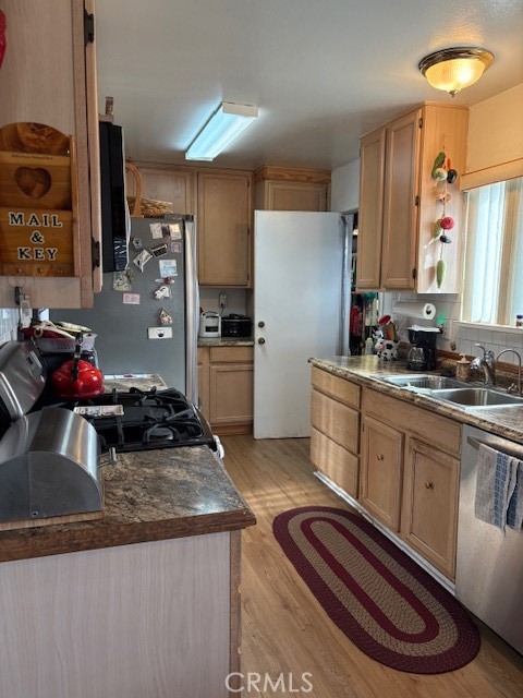 3529 Santa Maria Street Oceanside, CA 92056 - Photo 6 of 7 a kitchen with sink and refrigerator