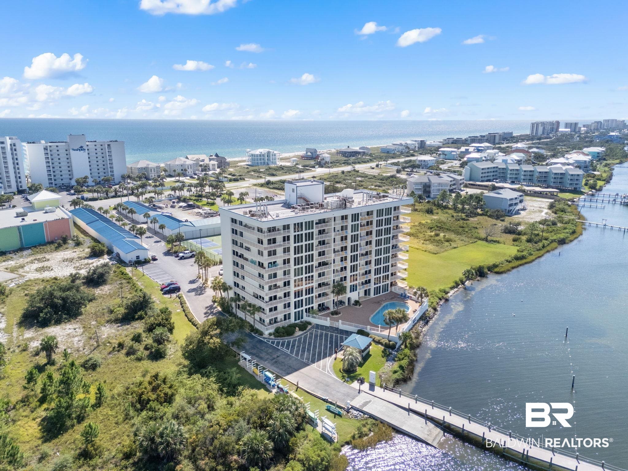 16284 Perdido Key Drive, Unit 912 Perdido Key, FL 32507 - Photo 47 of 49 View of urban area featuring a large body of water and apartment complex / building