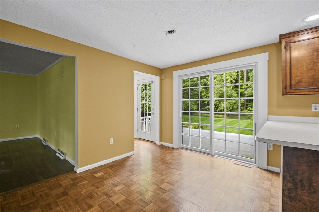 573 Main Street Dunstable, MA 01827 - Photo 11 of 42 a view of an empty room with a window