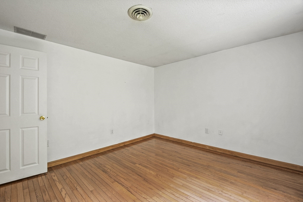 573 Main Street Dunstable, MA 01827 - Photo 22 of 42 a view of a room with wooden floor