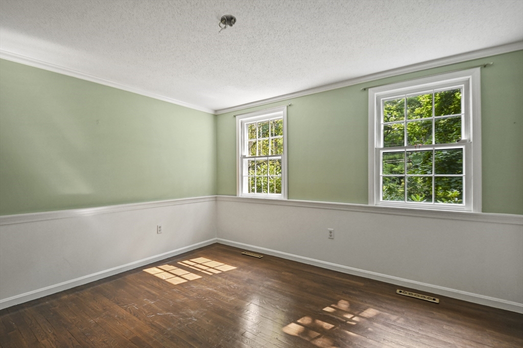 573 Main Street Dunstable, MA 01827 - Photo 6 of 42 an empty room with a window