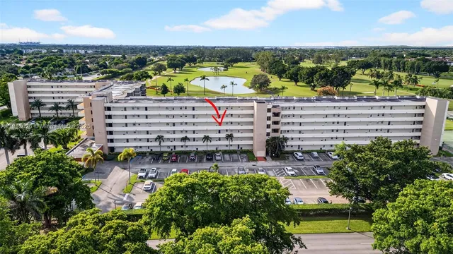 a view of a golf course with a lake view