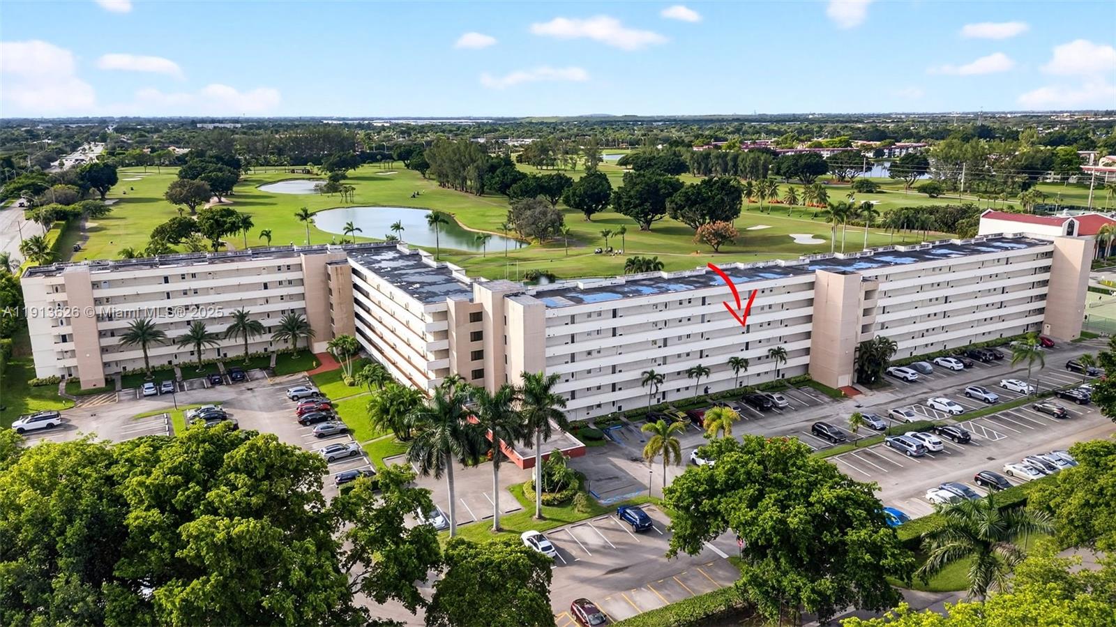 8900 Washington Street, Unit 410 Pembroke Pines, FL 33025 - Photo 24 of 79 an aerial view of a house with a garden and lake view