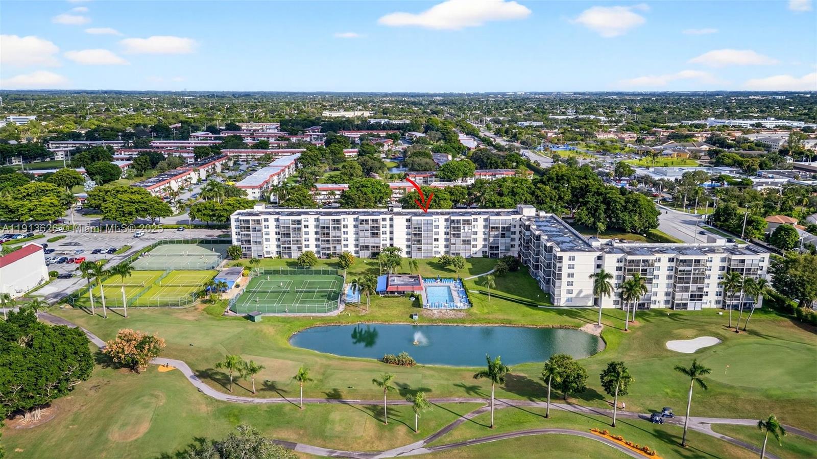 8900 Washington Street, Unit 410 Pembroke Pines, FL 33025 - Photo 29 of 79 an aerial view of residential houses with outdoor space and swimming pool
