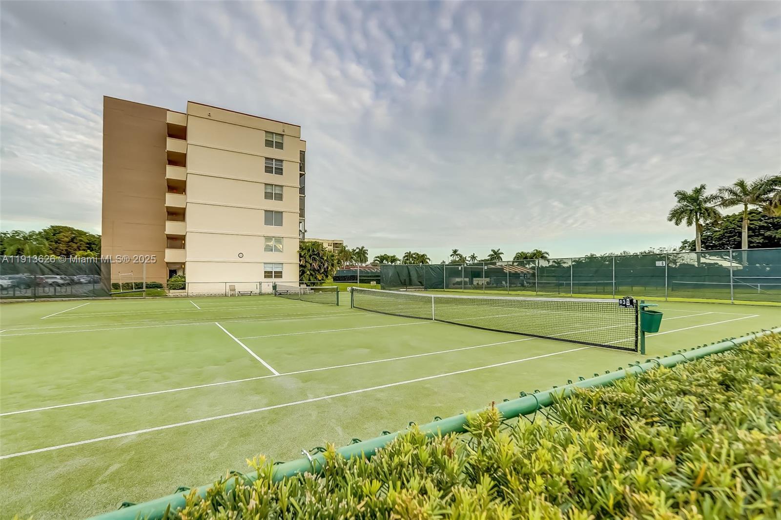 8900 Washington Street, Unit 410 Pembroke Pines, FL 33025 - Photo 41 of 79 a view of an outdoor space and tennis court
