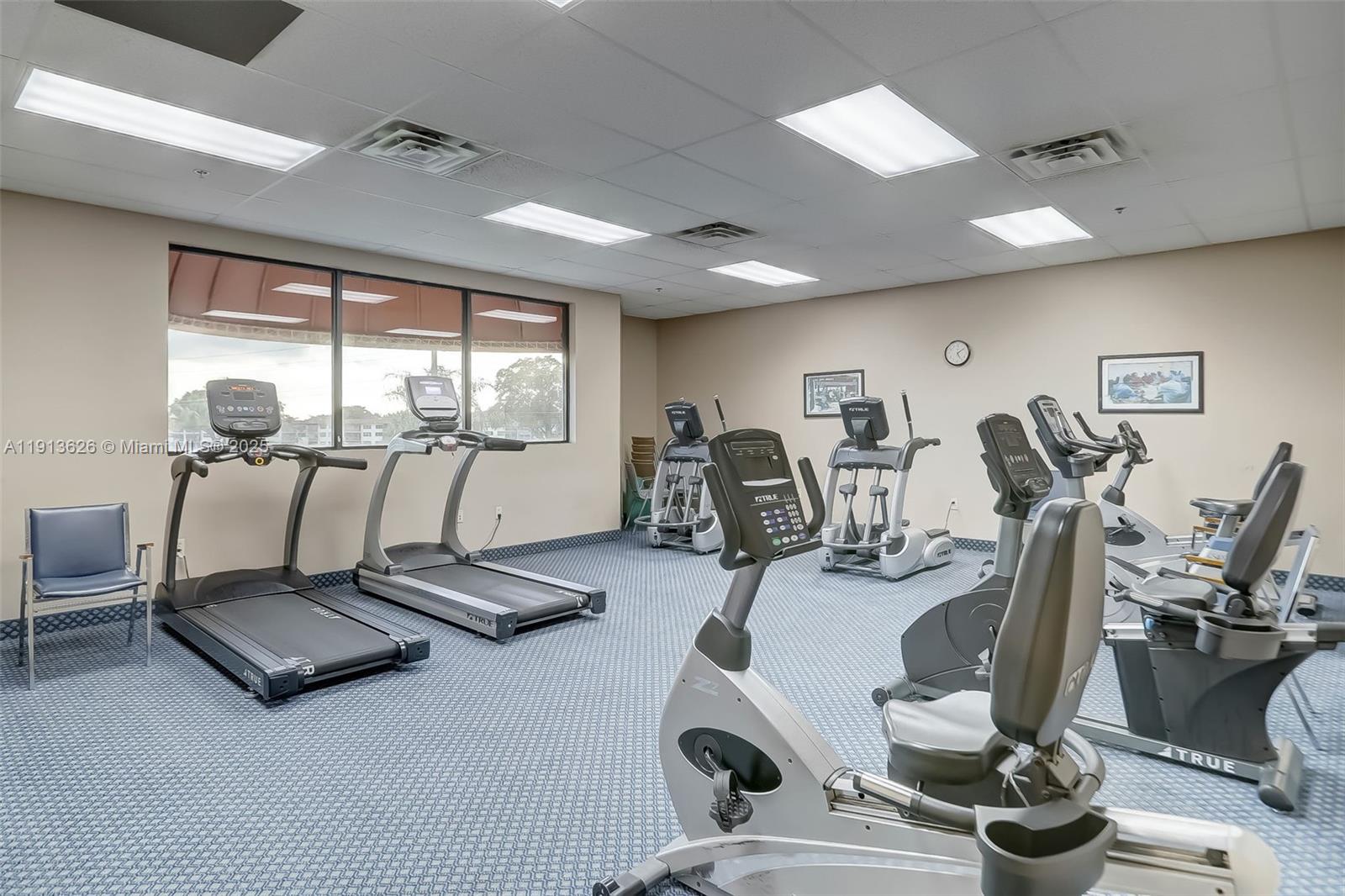 8900 Washington Street, Unit 410 Pembroke Pines, FL 33025 - Photo 57 of 79 a room with gym equipment