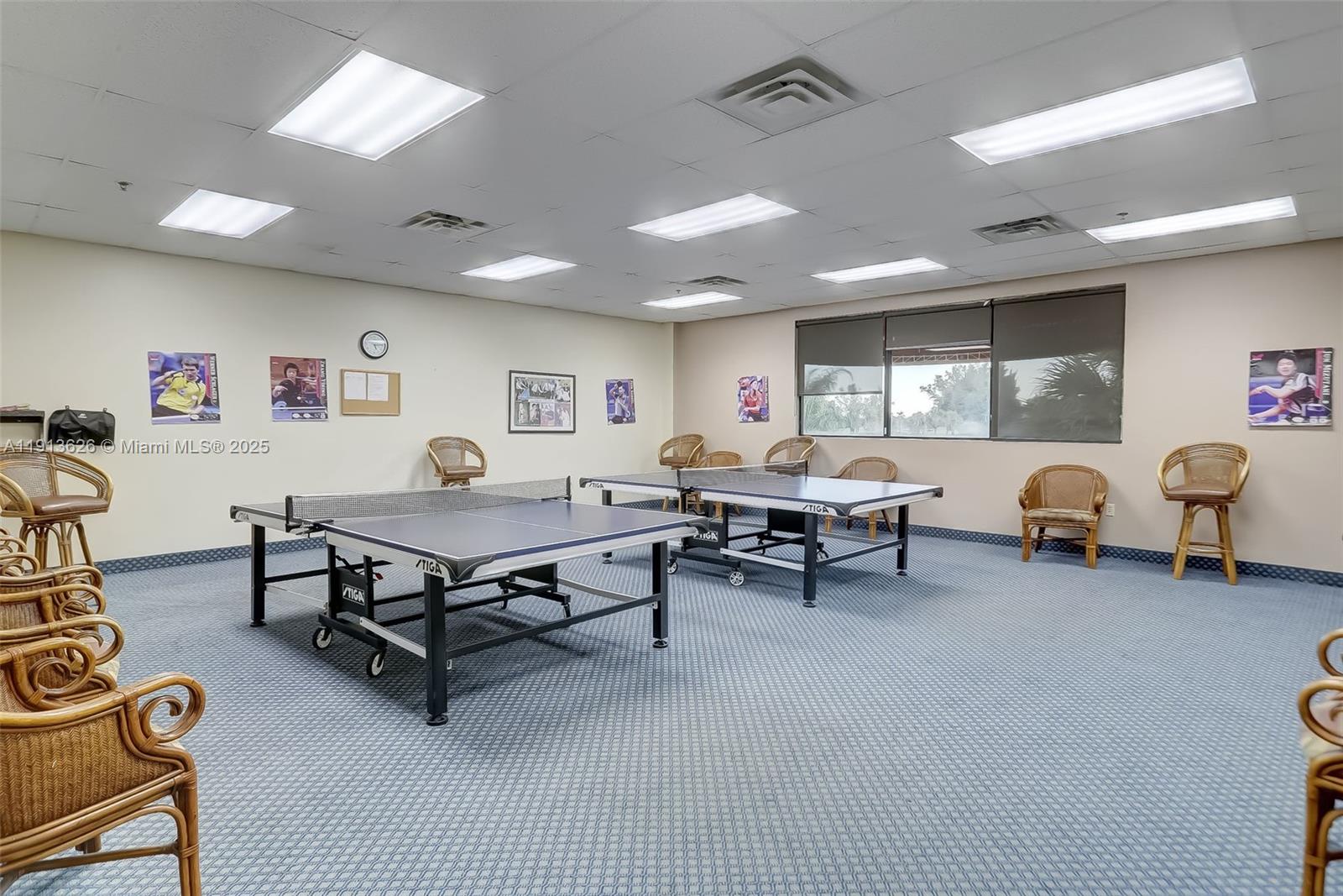 8900 Washington Street, Unit 410 Pembroke Pines, FL 33025 - Photo 60 of 79 a living room with furniture a window and gym equipment